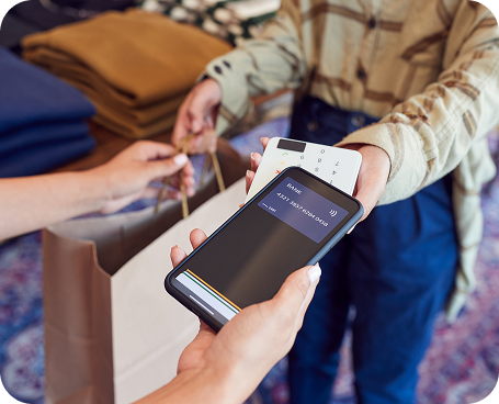 Contactless payment with a phone in a clothing shop