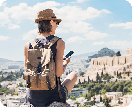 Tourist on phone with view of landscape