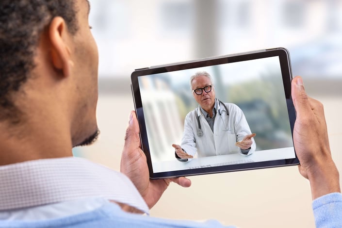 patient watching educational videos